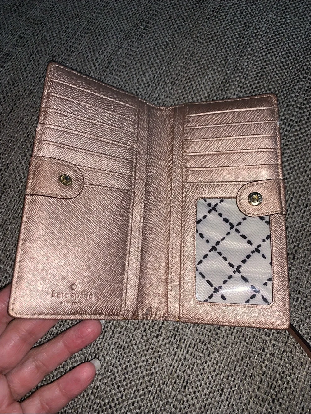 Kate Spade rose gold wallet with callouts
